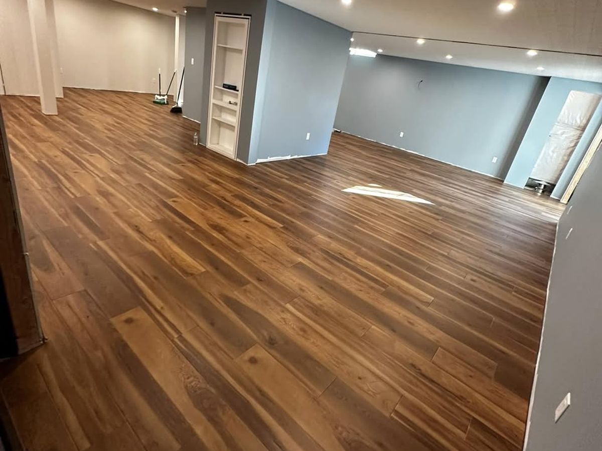 Wide-plank hickory vinyl, finished basement — Mike's Flooring, Feasterville-Trevose PA